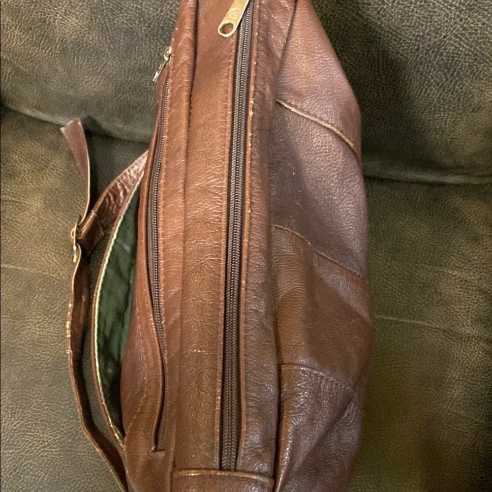 Brown Leather Messenger Bag with Adjustable Strap and Multiple Compartme…